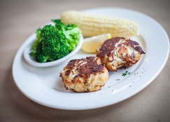 Mud City jumbo lump crab cakes with broccoli and corn